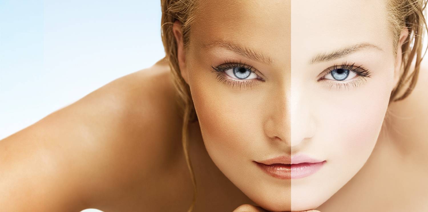 tanned lady jumping into blue beach water