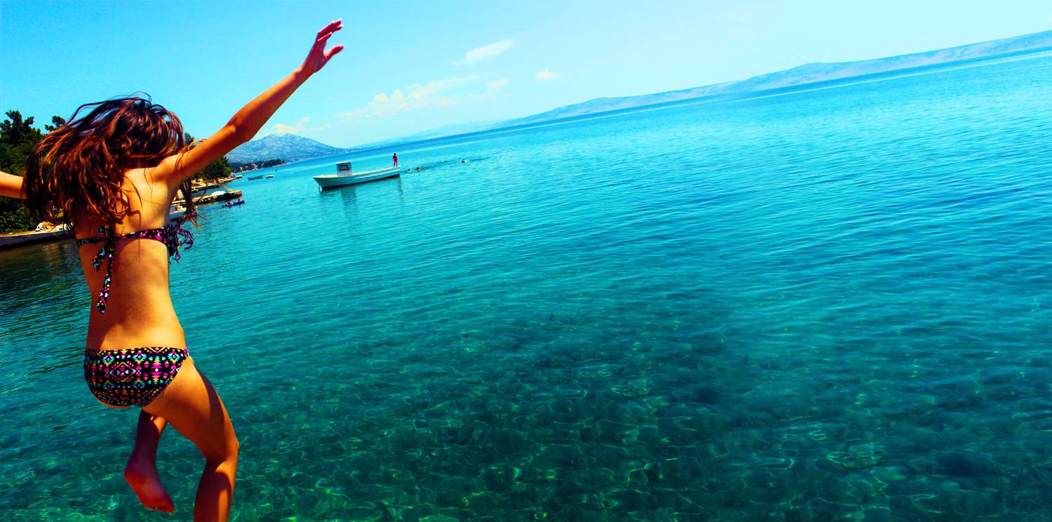 model with half tan and untanned skin