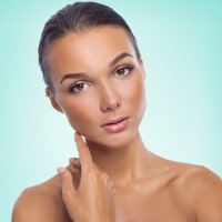 tanned model in water